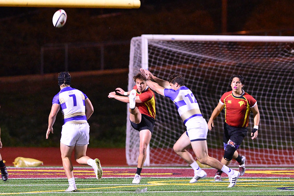 Beau Morgans kicks the ball out of trouble for Torrey Pines. Anna Scipione photo.