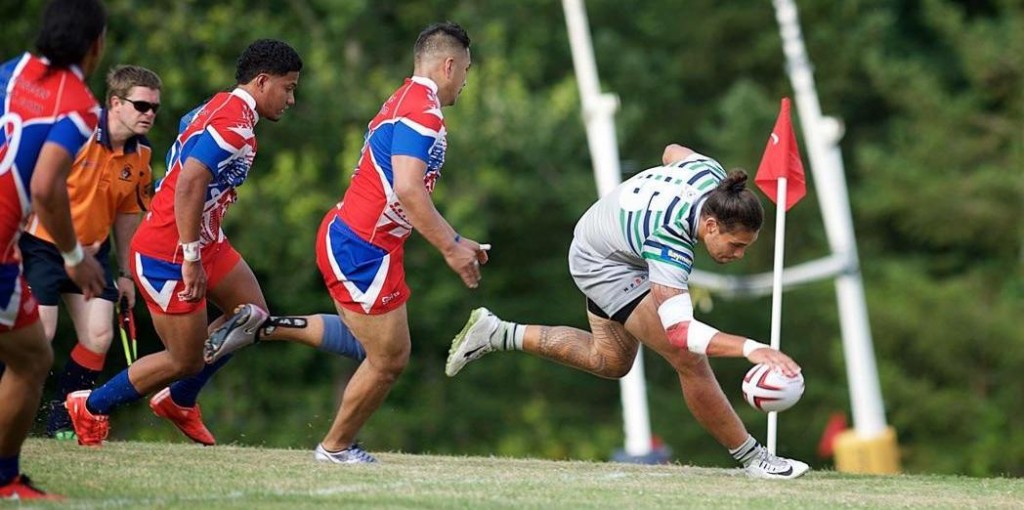 Psalm Wooching playing rugby. 