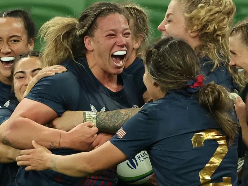 Hope Rogers is mobbed by her teammates after scoring the game-winner vs Australia in 2024. Photo World Rugby.