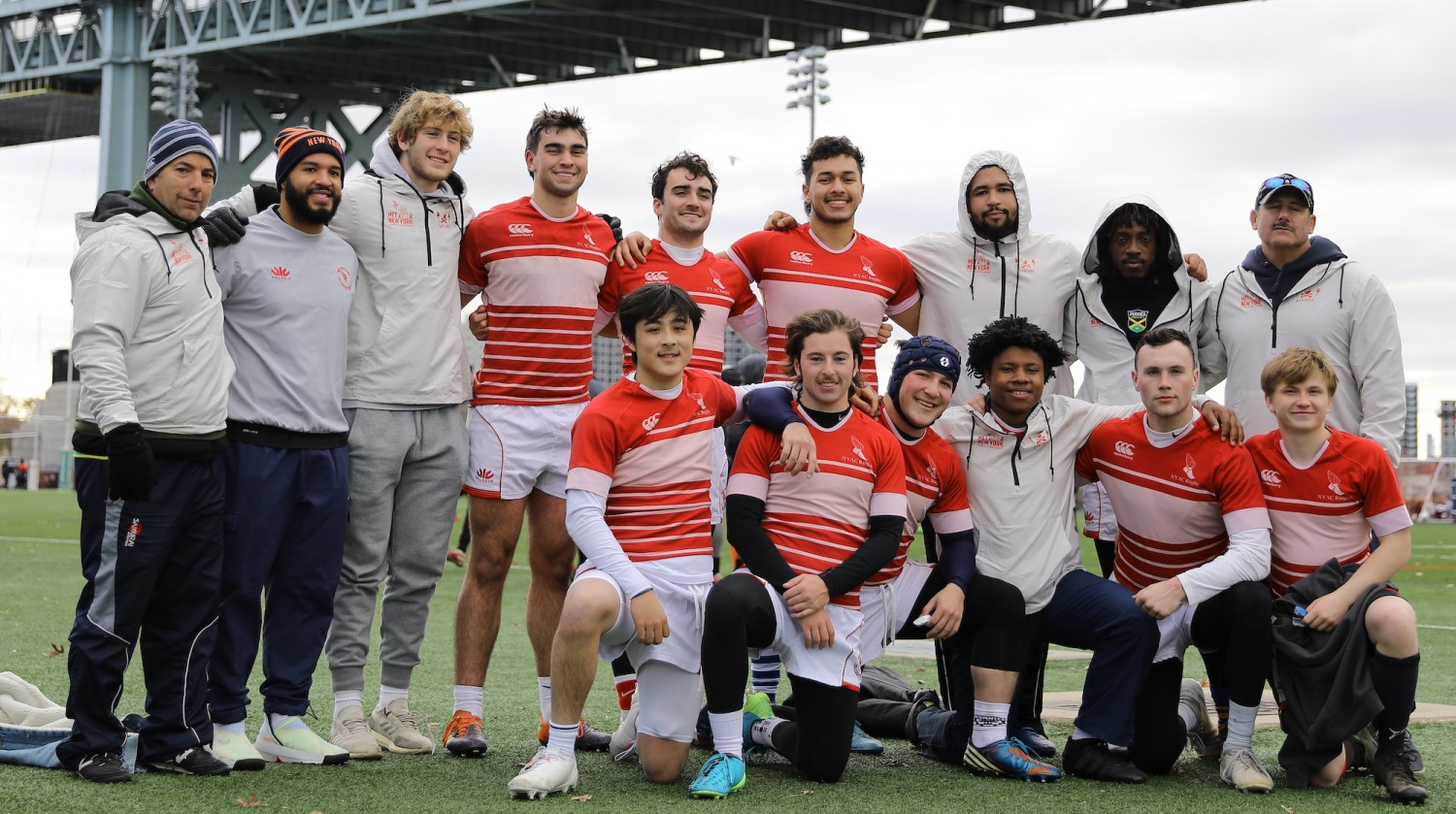 MetNY U23 Team (photo Keith Killeen):  Kneeling: Kojo Sheng (Santa Clara University), Luke Persanis (NYAC, captain), North Westall, NYAC), Justin Johnson (NYAC), KIam Anderson (Iona College), Dylan Lewis (Brown University)  Standing: Matt Persanis (Head Coach), Jesus Robles (Asst. Coach), Ash Mallach (University at Buffalo), Nick Lapponese (Fairfield University), PJ Maher (NYAC), Omar Elboudani (University at Buffalo), Yohendy Martinez (NYAC), Moriyah Tulloch (NYAC), Anthiny Nashataway (Manager)  (Not pictured: John Powers (NYAC) and Asst. Coach Tim Downey)