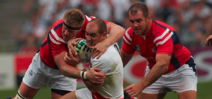 Alex Parker makes a tackle against England in the 2007 Rugby World Cup. Ian Muir photo.