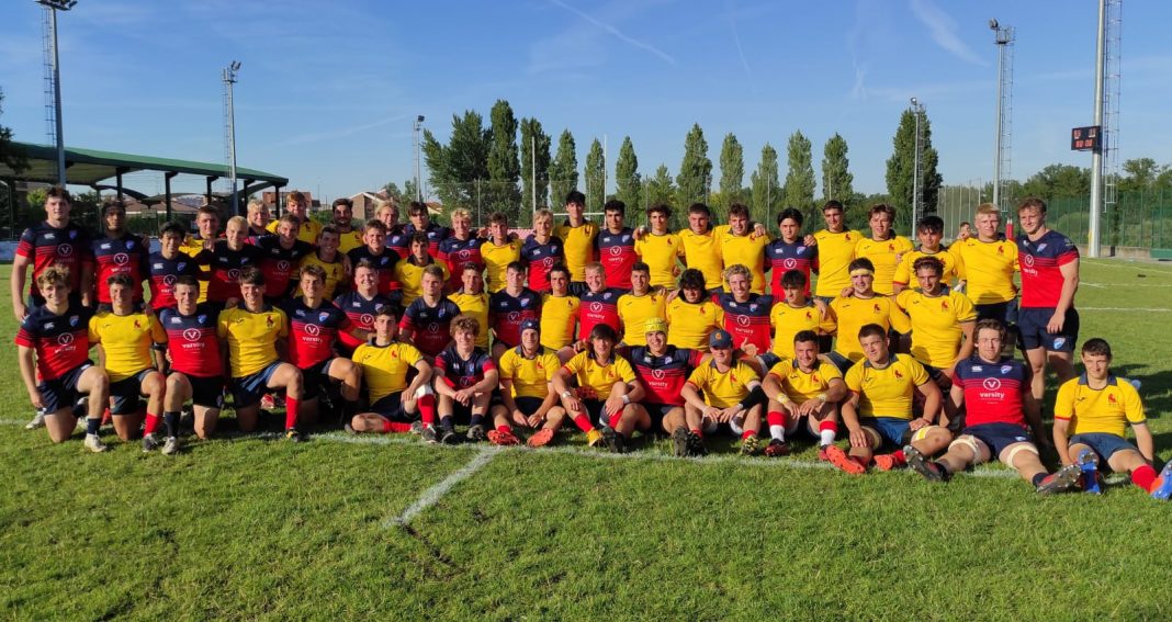 The Spanish and EIRA U18 players pose together after the two clashes on the field in Valladilod, Spain, July 1, 2021.