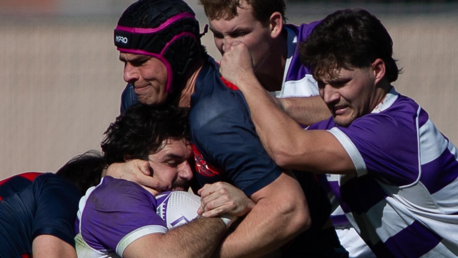 Dom Besag makes a tackle. Photo J Dalton Photography.