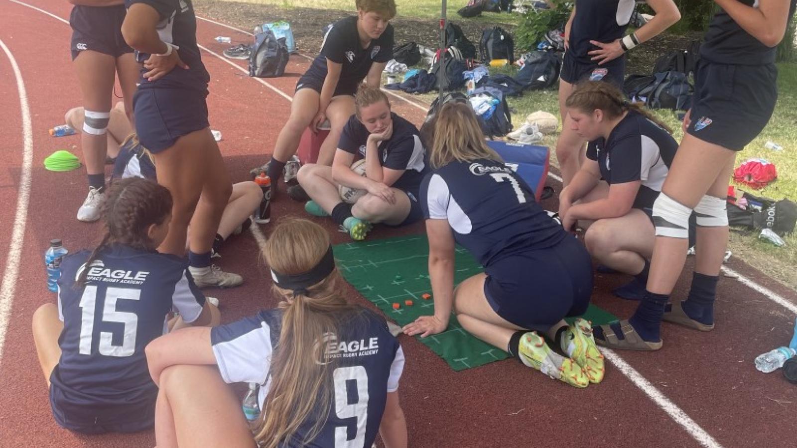 eira girls u16s strategizing 2023