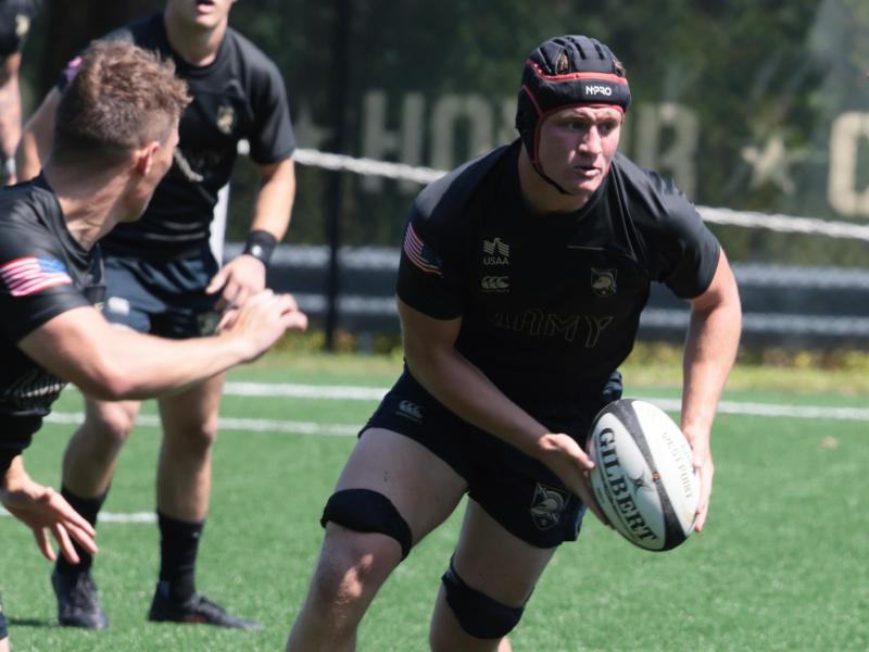 Max Doerfler takes the ball up for Army against Queens. Photo Walter Schmidlin.