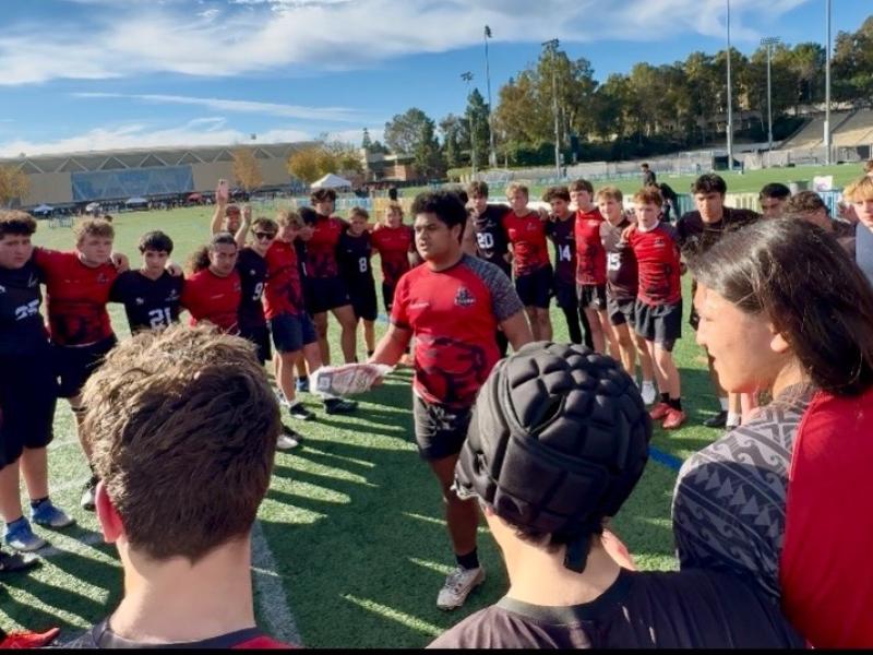Cavemen bond with their opponents at the 2026 Storer Classic.