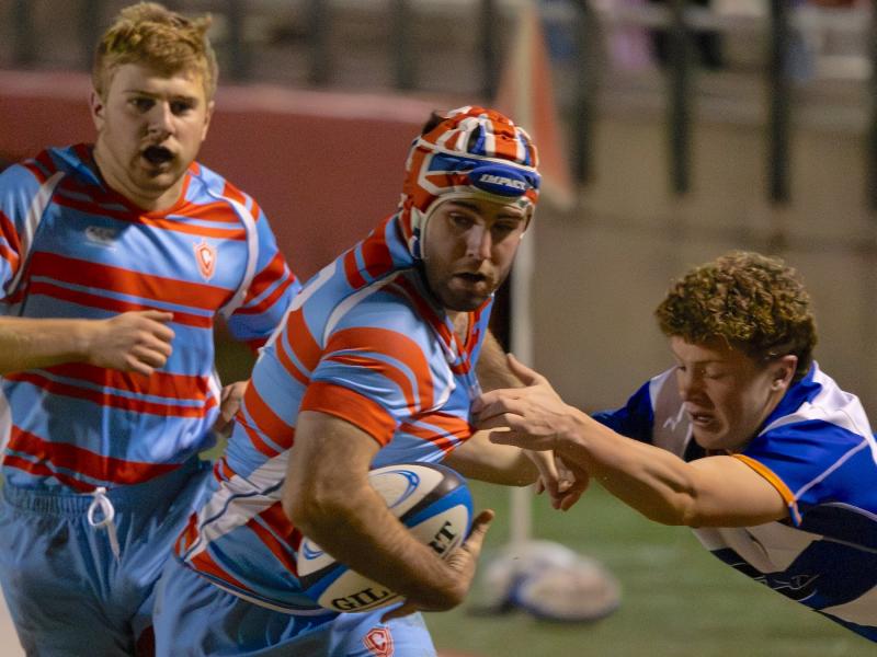 Thomas McKillop powers ahead for Charlotte Catholic. Dan Caple photo.
