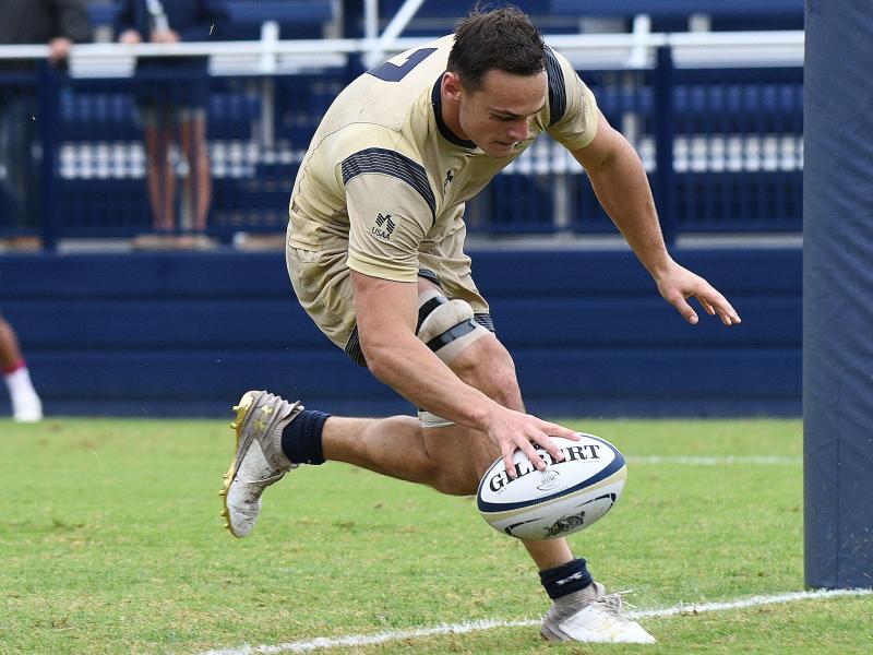 Aidan Gerber scores for Navy. Photo David Hughes.