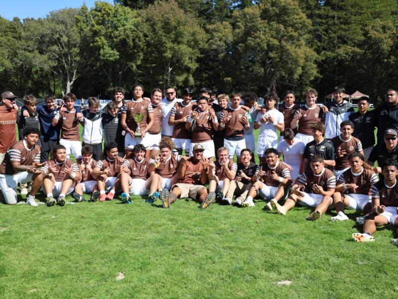 Tried but happy St. Francis celebrates their win.