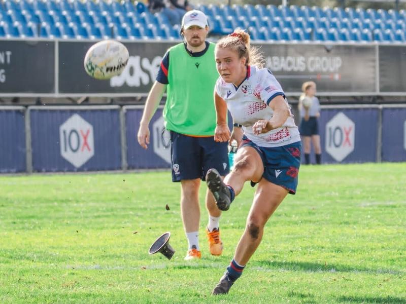 Annie Henrich slots the conversion while Jack Hanratty looks on. Photo South Africa Rugby.