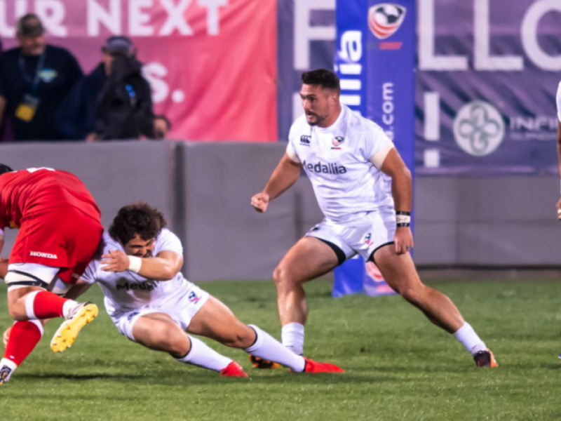 andrew guerra makes a tackle david barpal