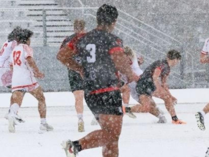 cavemen vs east hs in the snow