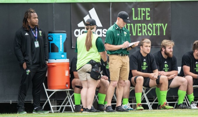 Colton Cariaga checking his notes during the D1A final. David Barpal photo.