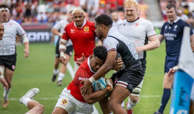Canada in white vs Tonga red. Photo World Rugby.
