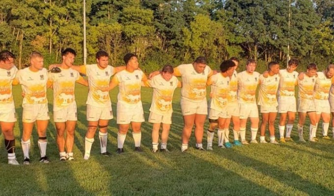 The Adrian College team lines up pre-match.