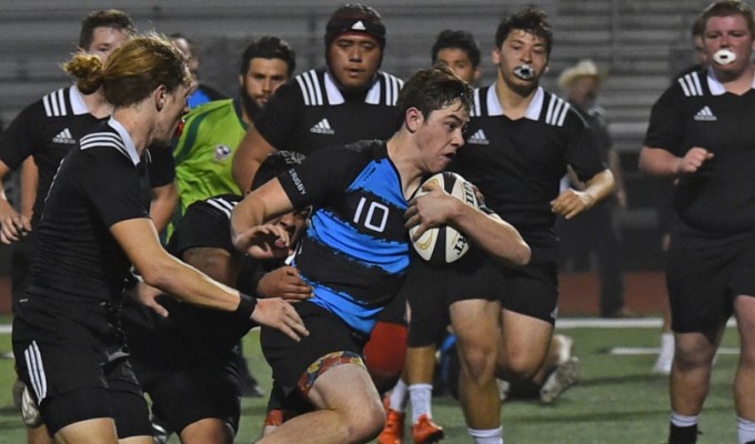 Alta Vista HS in black versus Jaguars in blue. Photo: Rogers Photography. 