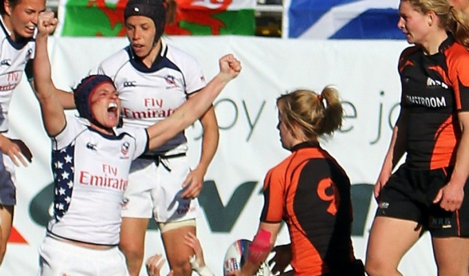 Amy Daniels celebrates scoring against the Netherlands in 2012. Numina Photo.