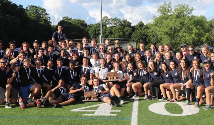 Belmont HS boys and girls celebrate winning the MIAA state championships in 2019.