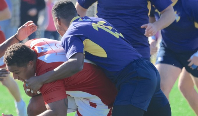 Yes we know Bradley Mayekiso of Principia can run, so here's a photo of him making a tackle. Photo Alexandra Halm.