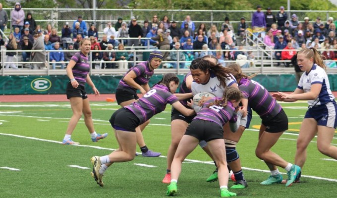 Big hits in front of a big crowd. Brunswick draws in defenders. Alex Goff photo.