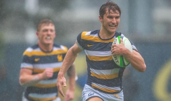 Why is this man smiling? Oliver Newall is off and running vs Arizona. Photo Cal Varsity Rugby.