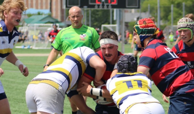 Top seeds played each other this past weekend. St. Ignatius in white, blue, and gold; Charlotte Cardinals in red and blue. 