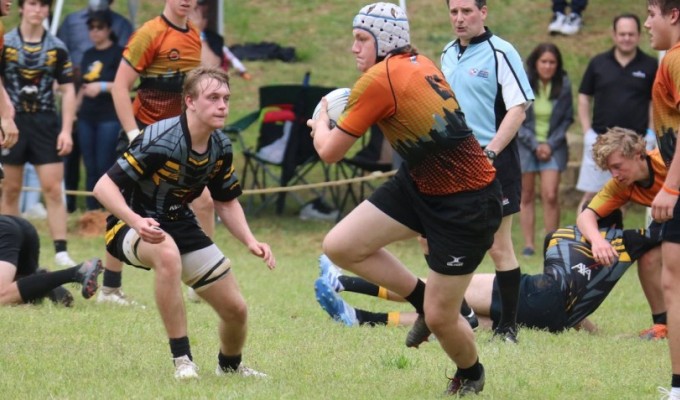Bruton Peacock charges ahead for Charlotte against Aspetuck. Photo Charlotte Tigers. 