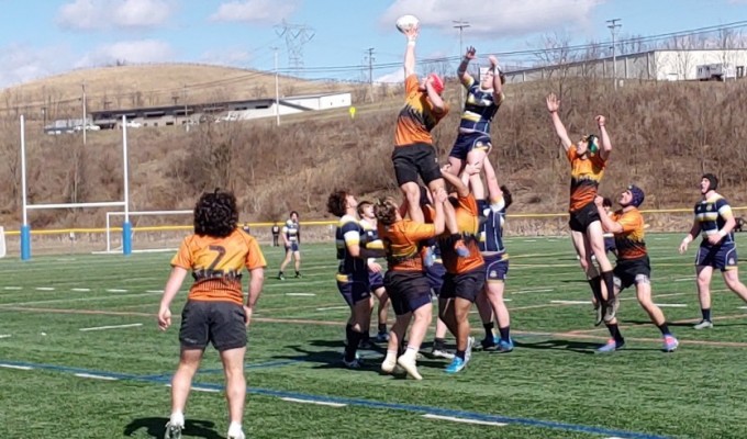 Charlotte goes up for a lineout vs St. Ignatius. Alex Goff photo.