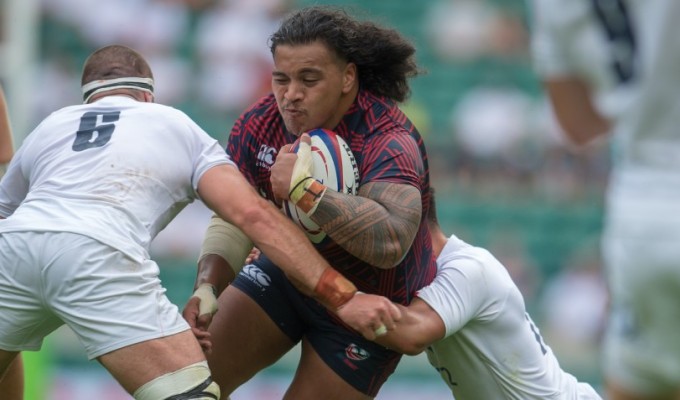 David Ainu'u takes the ball up against England. Ian Muir photo.