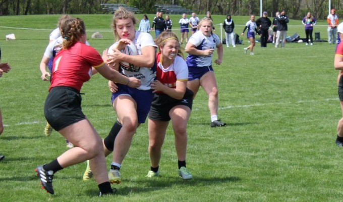 Alyssa Post gets defensive attention (DSHA in red, Sparta Rock in white). Alex Goff photo.