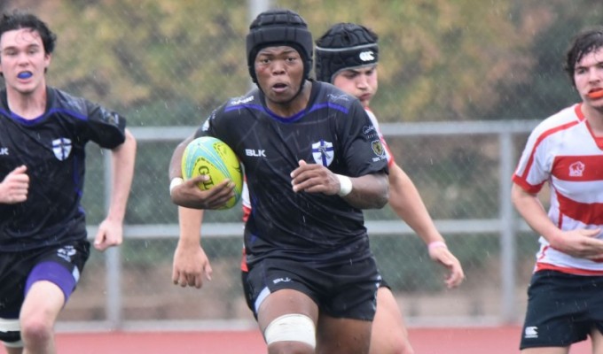 Egya Reddy charges ahead for St. Augustine. Bill Strack photo.