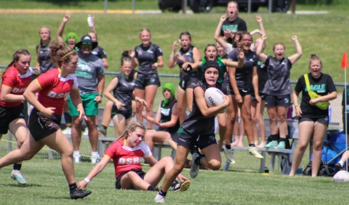 Hero of the day: Kanani Watts on her way to her third try. Alex Goff photo.