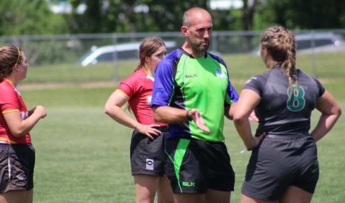 Referee Jeff Noe explains himself at the Girls HS National Championships. Alex Goff photo.