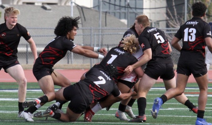 Herriman tacklers swarm in. Tonia McPeak photo.