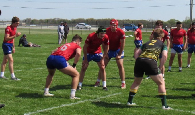 HSE forwards, in red, set up in the lineout at the Midwest tournament. Alex Goff photo.