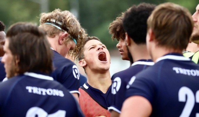 Iowa Central CC rugby players huddle up after one of their victories.