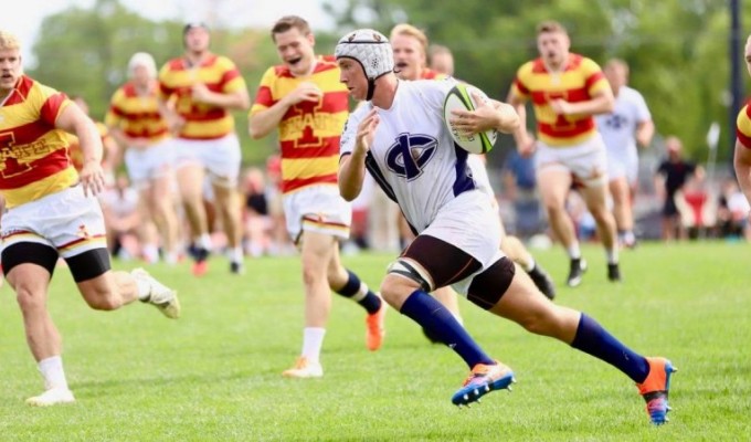 Iowa State defenders on the chase against the Tritons. Photo Iowa Central CC Rugby.