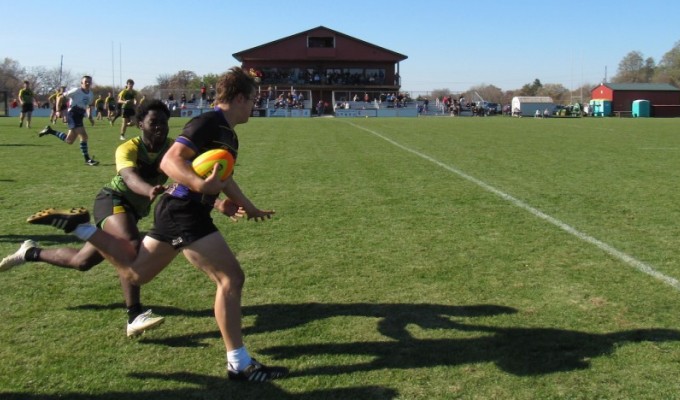 Illinois State in green and yellow against Northern Iowa in black and purple in the GMW final. Alex Goff photo.