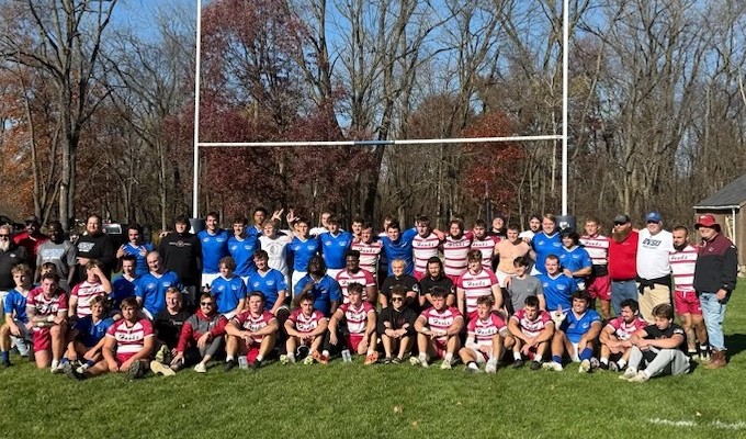 IUP and GVSU players pose post-match.