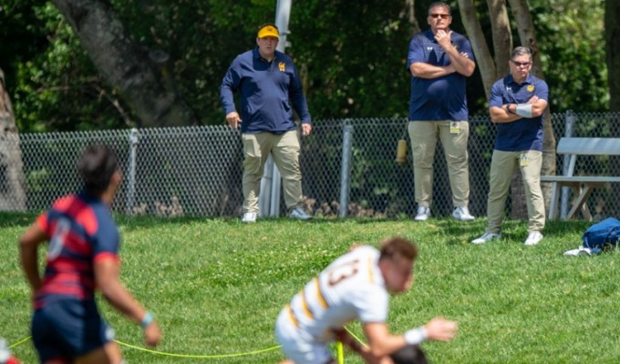 Jack Clark and his coaching staff observe during the 2019 D1A playoffs. David Barpal photo.