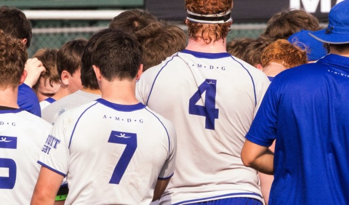 Jesuit NOLA huddles up.