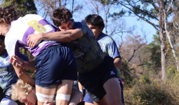 Max Buckingham makes a tackle for Laney HS.