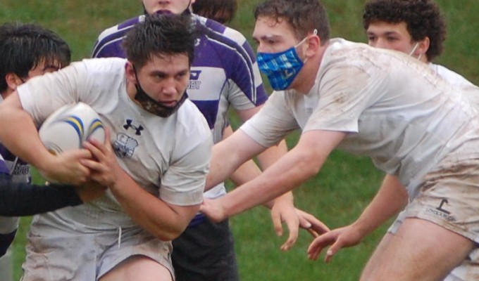 Loyola Blakefield takes the ball up in their semifinal against Mount St. Joseph. Ryan Nickel photo.