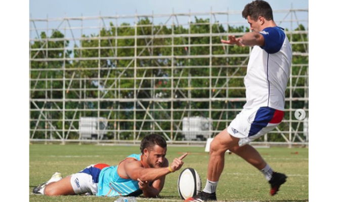 Will Magie kicks and JP Eloff holds as they train in Bermuda for the Ohio Aviators. Photo from Instagram.