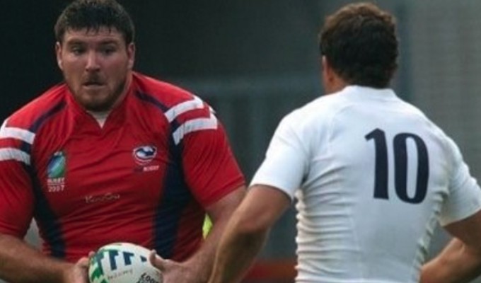 Mike MacDonald sizes up England's Ollie Barkley at the 2007 Rugby World Cup. Photo USA Rugby.