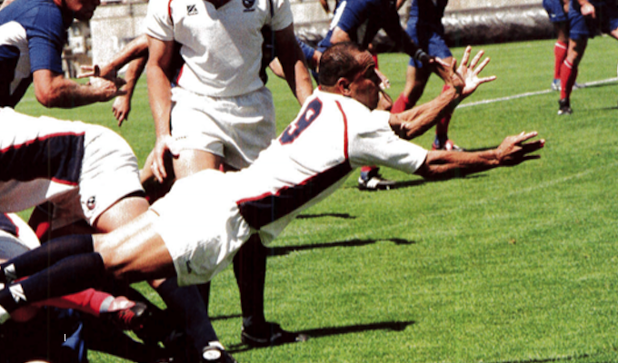 Mose Timoteo sends the ball out in the USA's close, 39-31 loss to France in 2004. Photo Rugby Magazine.