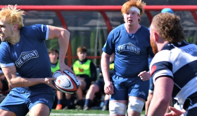 MSM in blue and UMW in stripes. David Hughes photo.