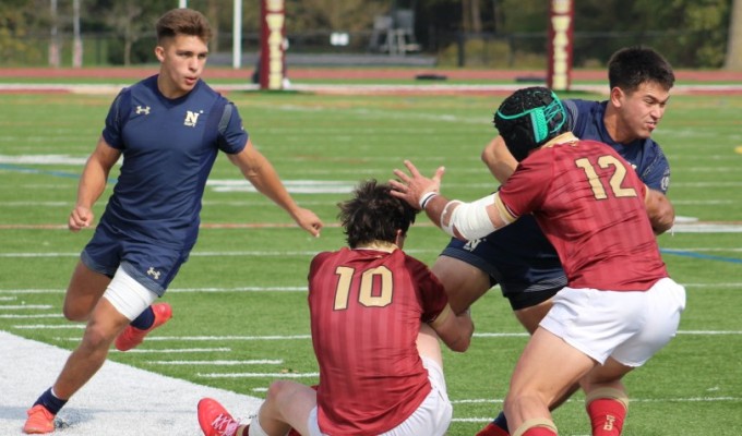 Walsh defends a Navy surge in the first half. Alex Goff photo.