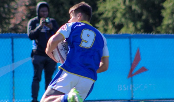 Remy Thomson runs in a try for Notre Dame College. Jack Nece photo. 