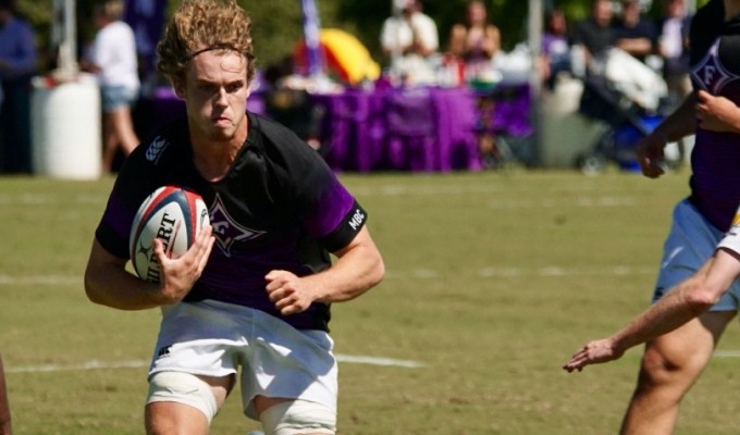 Pat Conley takes it forward for Furman. Buster Kennett photo.